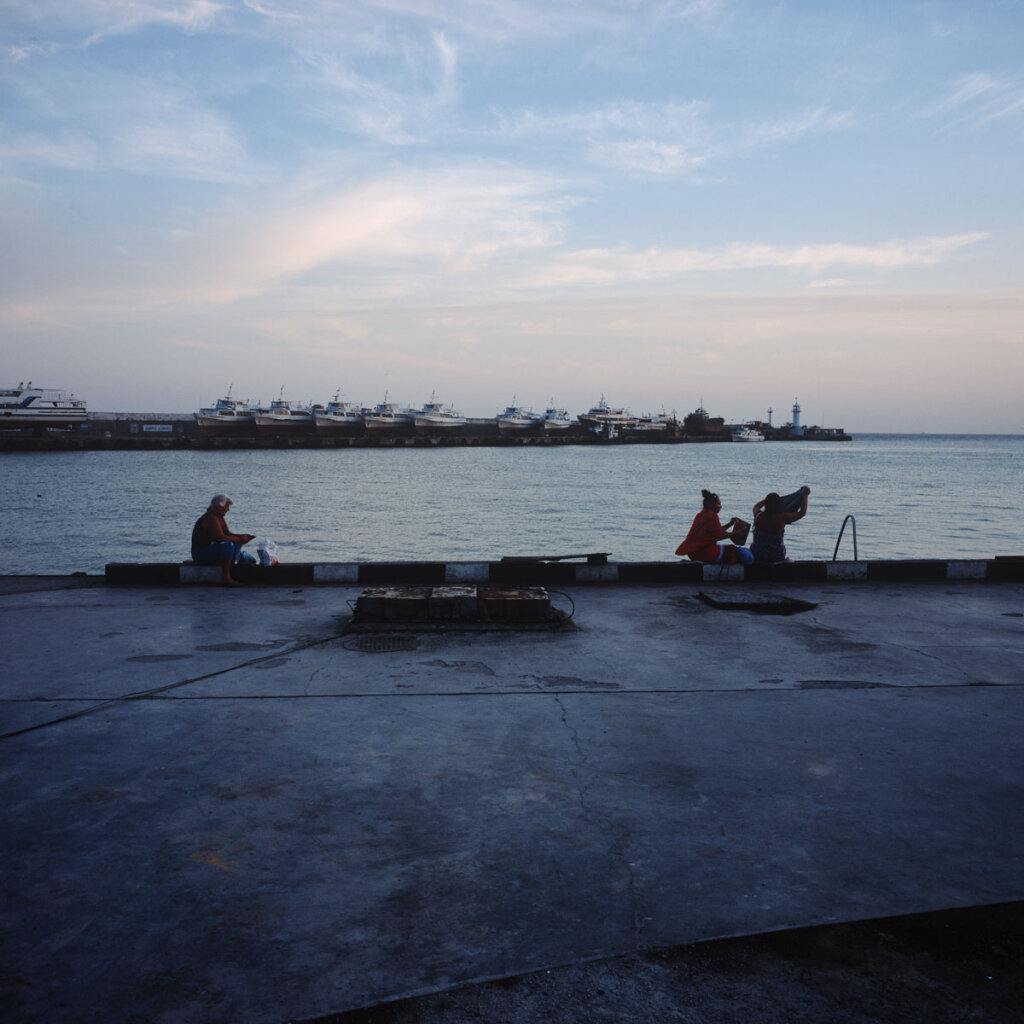 Locals relaxing in the harbour of Yalta